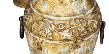 Two antique vases isolated on a white background.